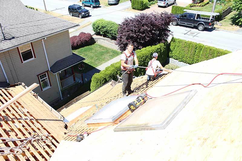 Reroofing house in Vancouver