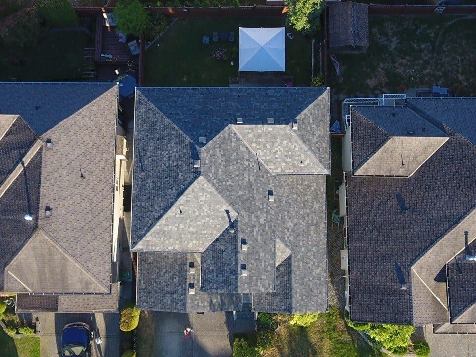 aerial view roof repair project shingles