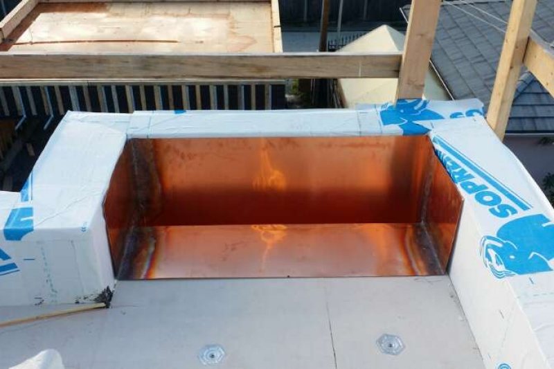copper drain on flat roof