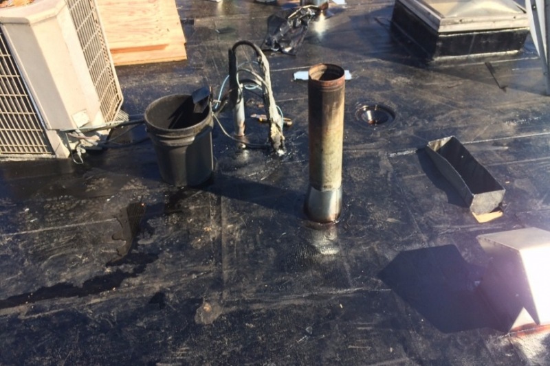 sealing vents on torch on commercial roof