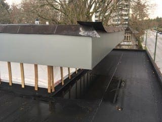 Roofing cladding fascia wrapped